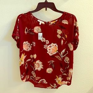 Red floral print blouse